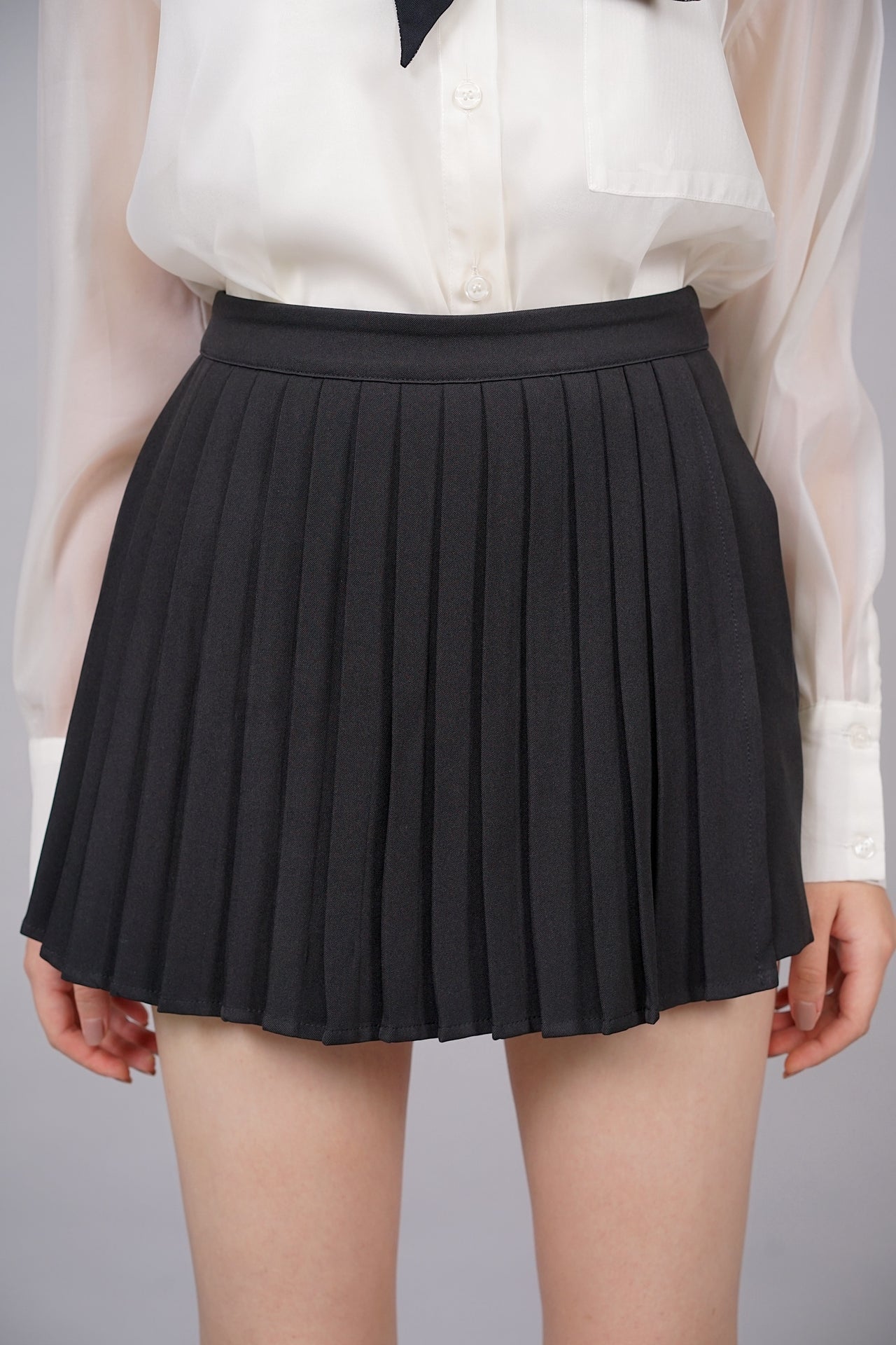 Asymmetrical Mini Pleated Skorts in Black