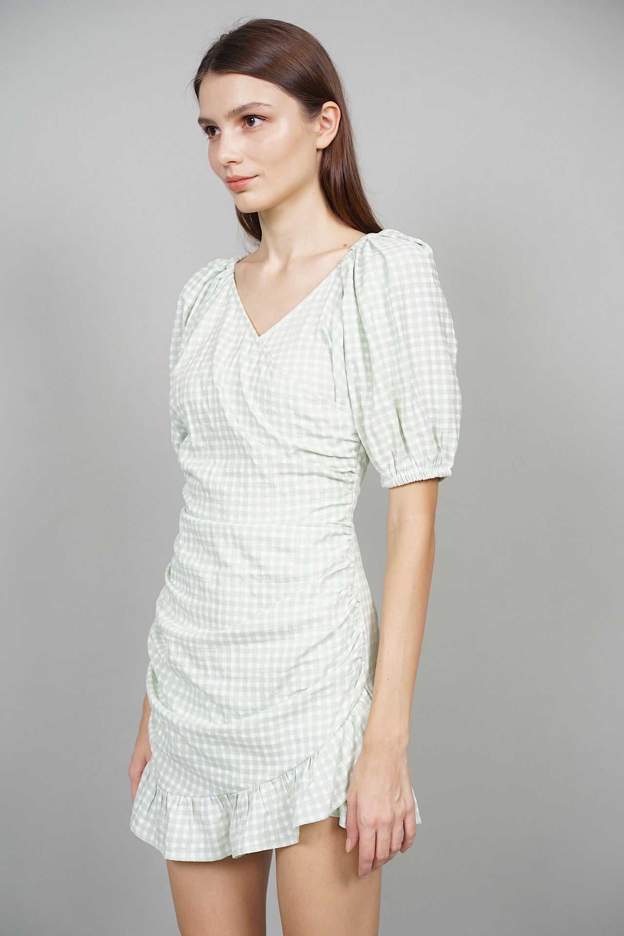 Joy Puffy Skorts Romper in Pale Green Gingham